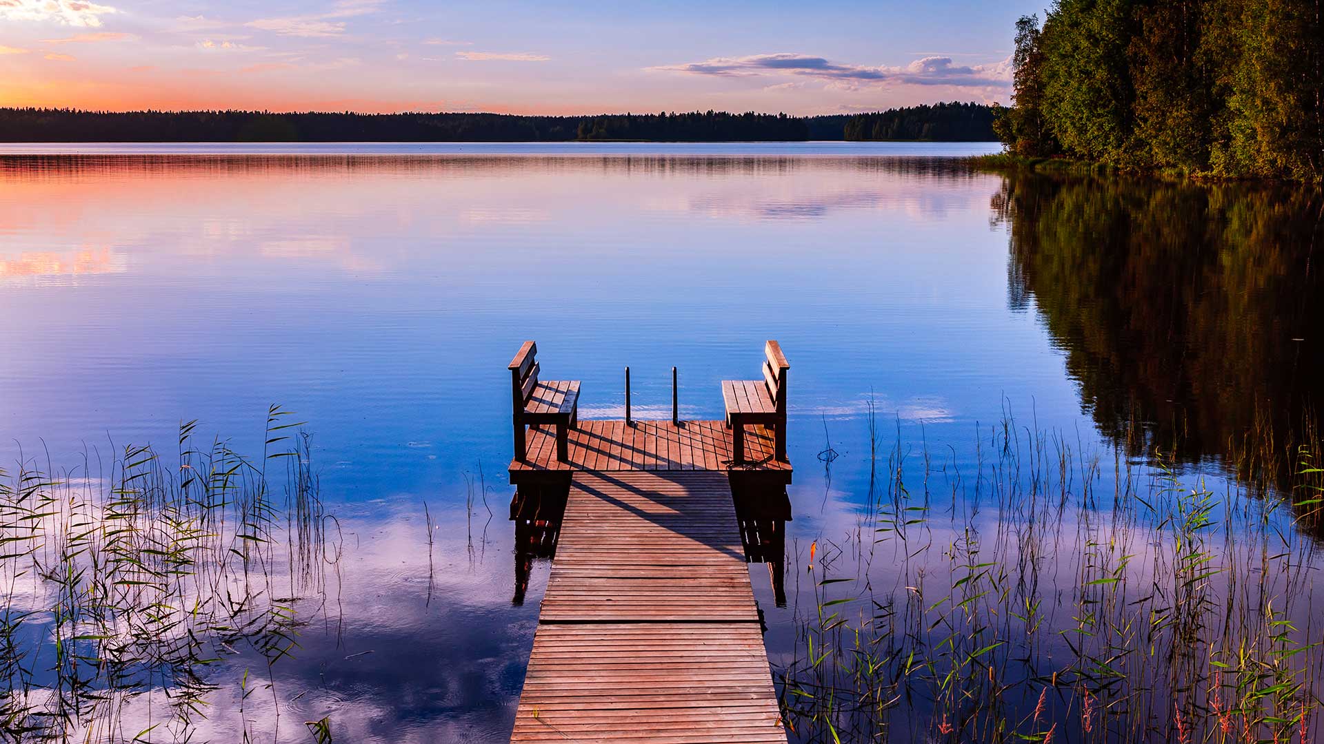 perspective-view-of-a-wooden-pier-with-chairs-on-t-2023-11-27-04-53-15-utc